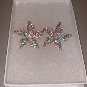 Gold flower statement earrings